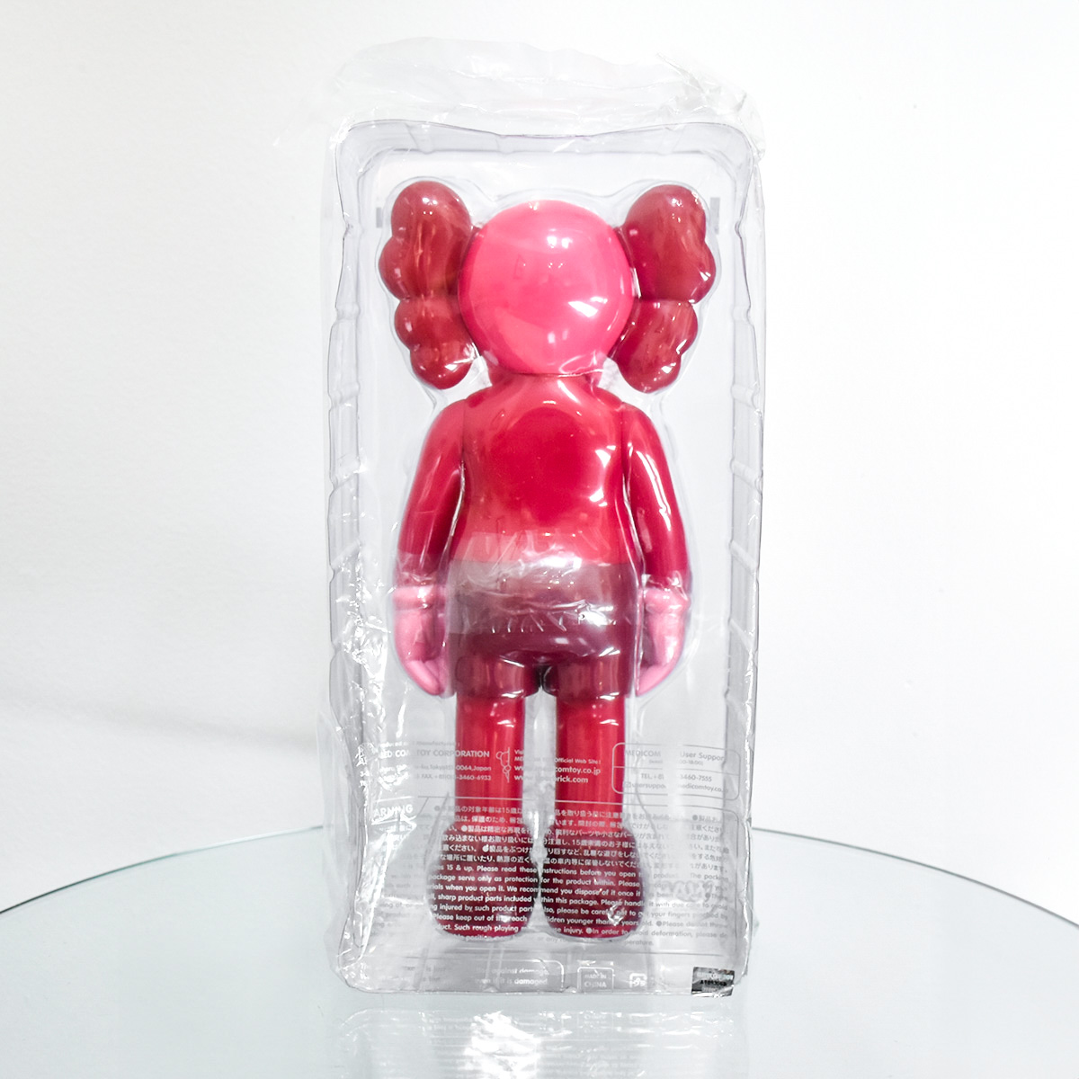 back of kaws companion blush open edition