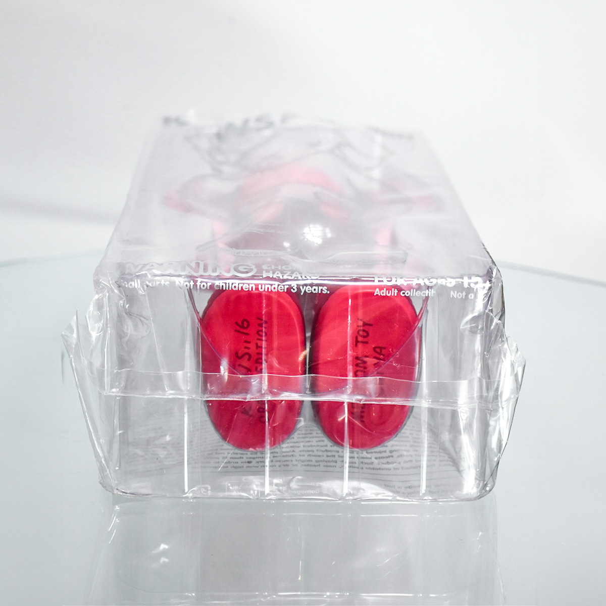 bottom of kaws companion blush open edition