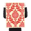 person holding obey shepard fairey parlor print artist proof