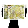 person holding invader roma signed map print