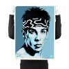 person holding shepard fairey obey zoolander print