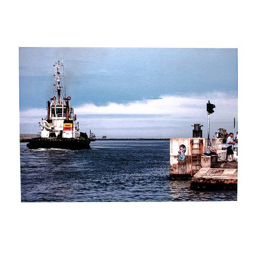 invader hello my game is postcard with mermaid invader on wall of pier and tugboat in water