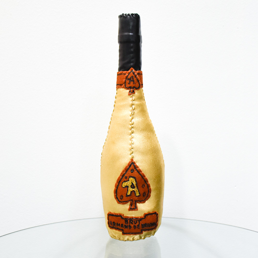 lucy sparrow ace of spades champagne bottle sculpture