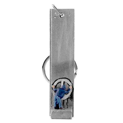 banksy graffiti peace sign keychain sculpture in white