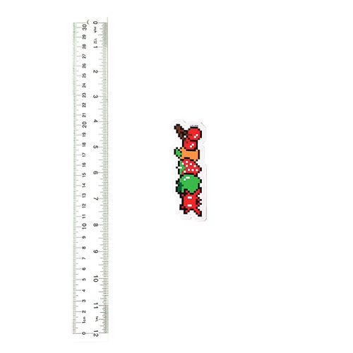 invader with fruits sticker next to ruler for scale