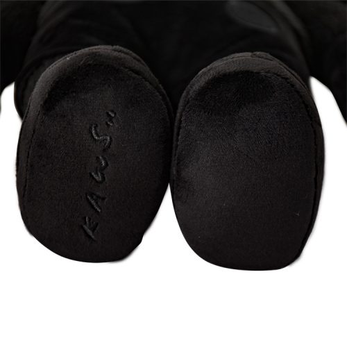 kaws holiday hong kong black plush feet with kaws signature