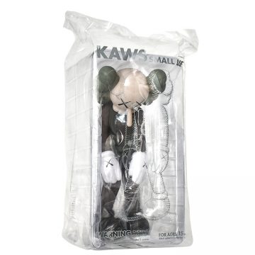 kaws small lie brown in sealed package side view