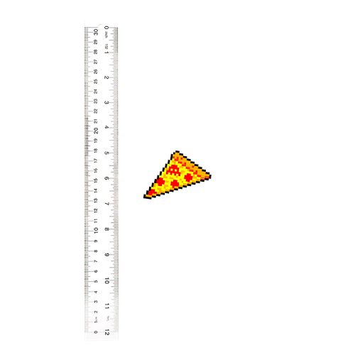 invader pizza sticker next to ruler for scale