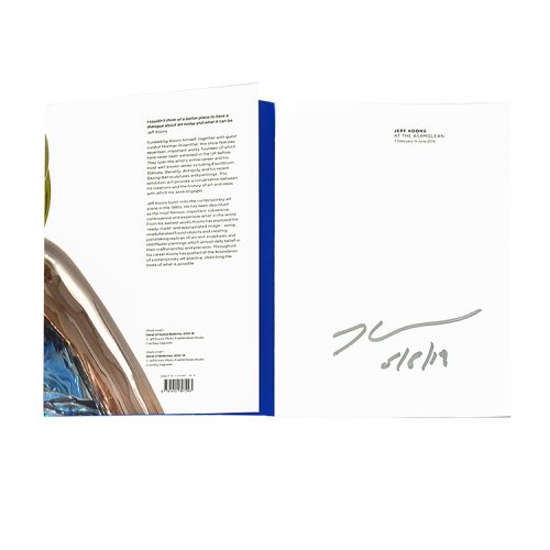 jeff koons at the ashmolean signed book showing opened with Jeff Koons signature inside