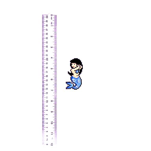 invader mermaid sticker next to ruler for scale