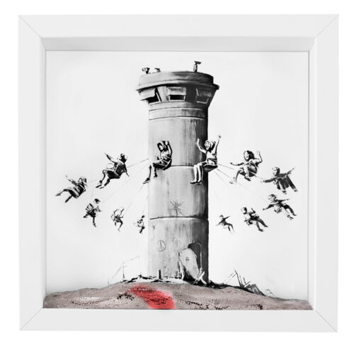 banksy box set walled off hotel shown with print and painted concrete piece