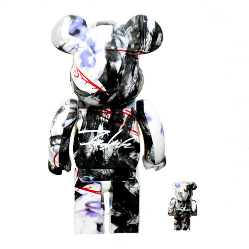 futura bearbrick 400 and 100 shown from behind with futura signature