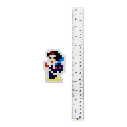 invader princess sticker shown next to ruler for scale