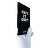 banksy cut it out book shown in hand