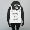 close up of keep it real side on banksy dj dm laugh now keep it real record