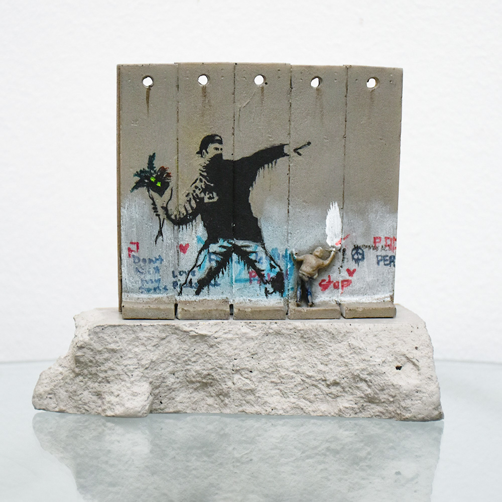 banksy walled off hotel flower thrower wall sculpture