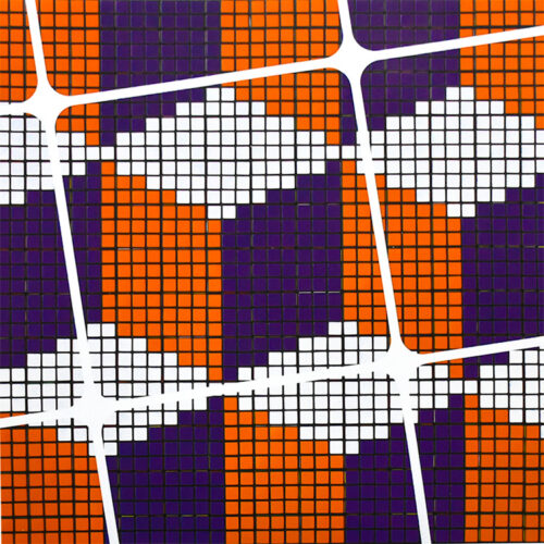 close up middle of invader rubikcubist exhibition poster from MIMA with q*bert video game stage