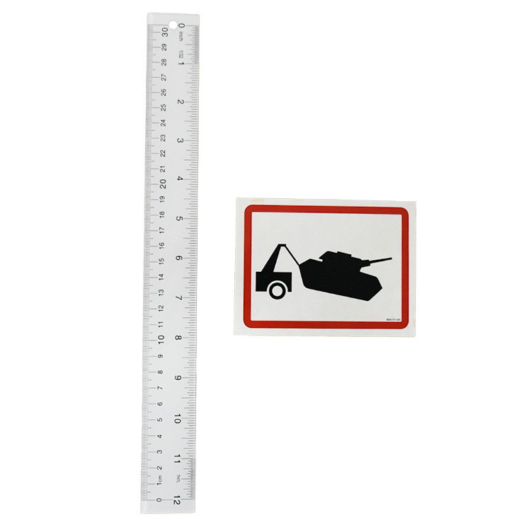 banksy tank towing bnk/5y025 sticker next to ruler for scale