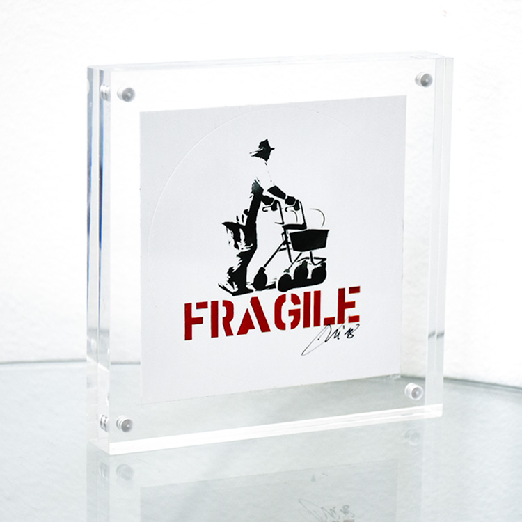 kunstrasen fragile signed sticker framed in clear block frame