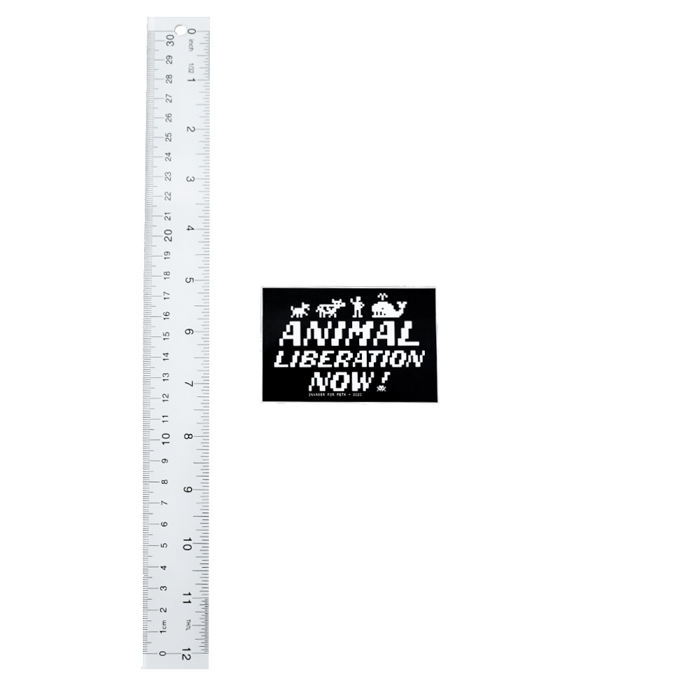 invader peta animal liberation now sticker next to ruler