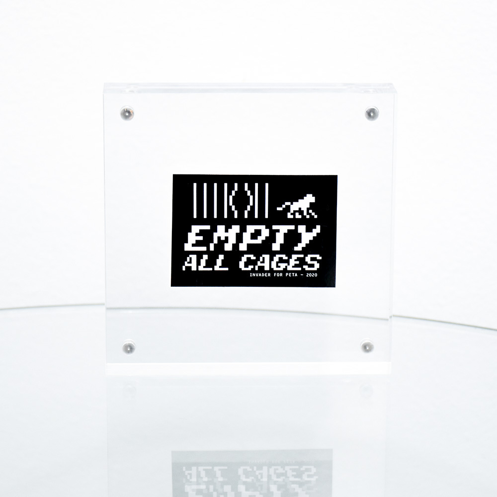 invader peta empty all cages sticker in frame